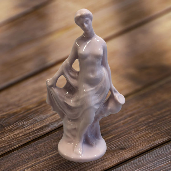 Porcelain Figurine of Woman with Water Jug