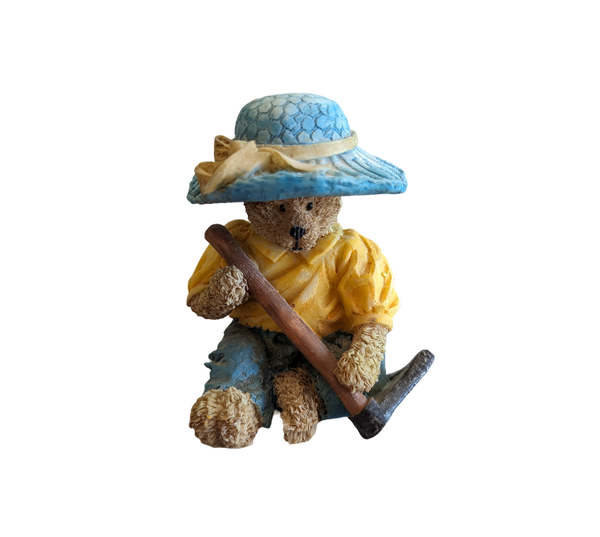 Teddy Bear wearing blue hat & Garden Hoe