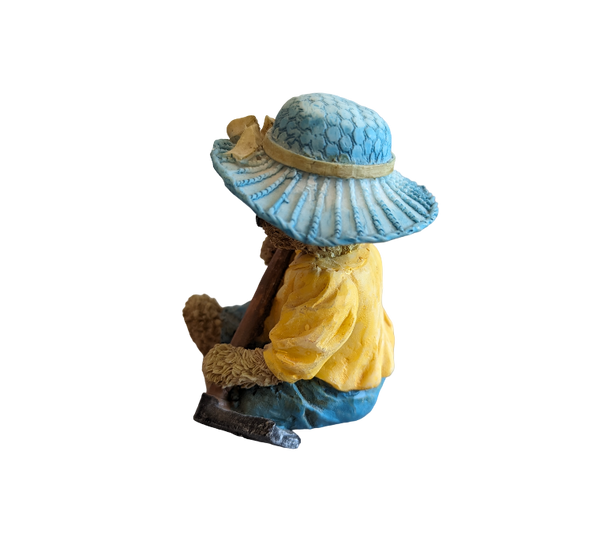 Teddy Bear wearing blue hat & Garden Hoe