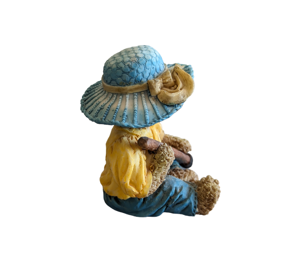 Teddy Bear wearing blue hat & Garden Hoe