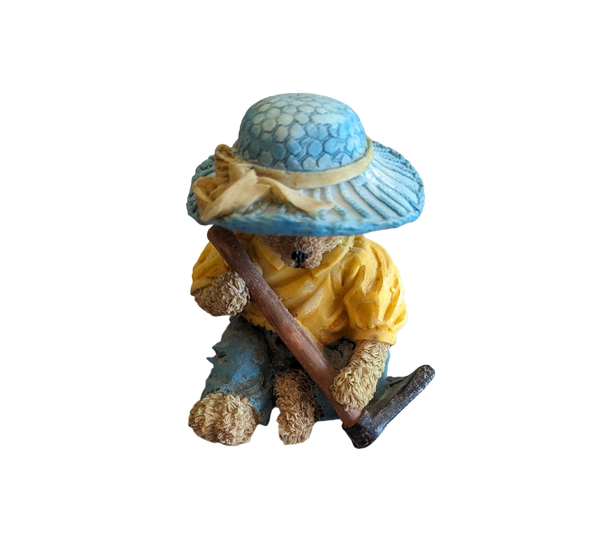 Teddy Bear wearing blue hat & Garden Hoe