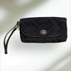 COACH Signature large flap Wristlet