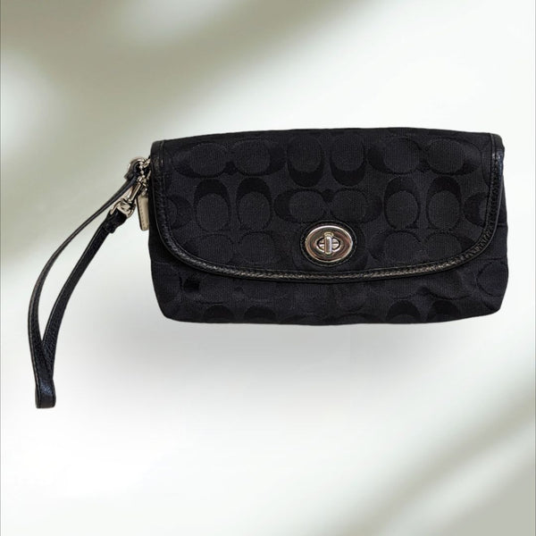 COACH Signature large flap Wristlet