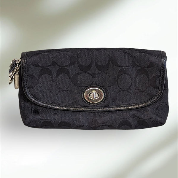 COACH Signature large flap Wristlet