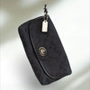 COACH Signature large flap Wristlet