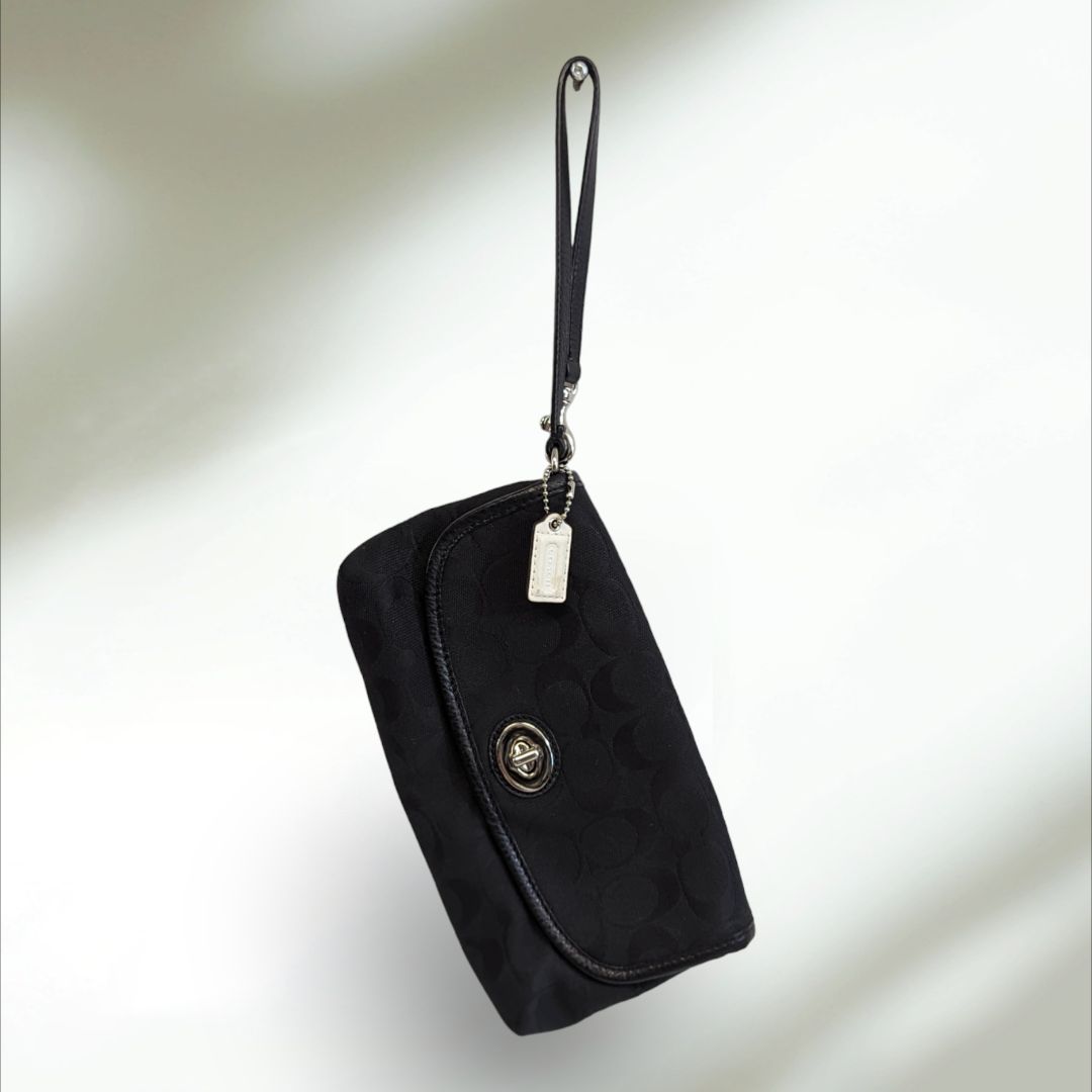 COACH Signature large flap Wristlet