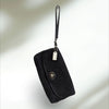 COACH Signature large flap Wristlet