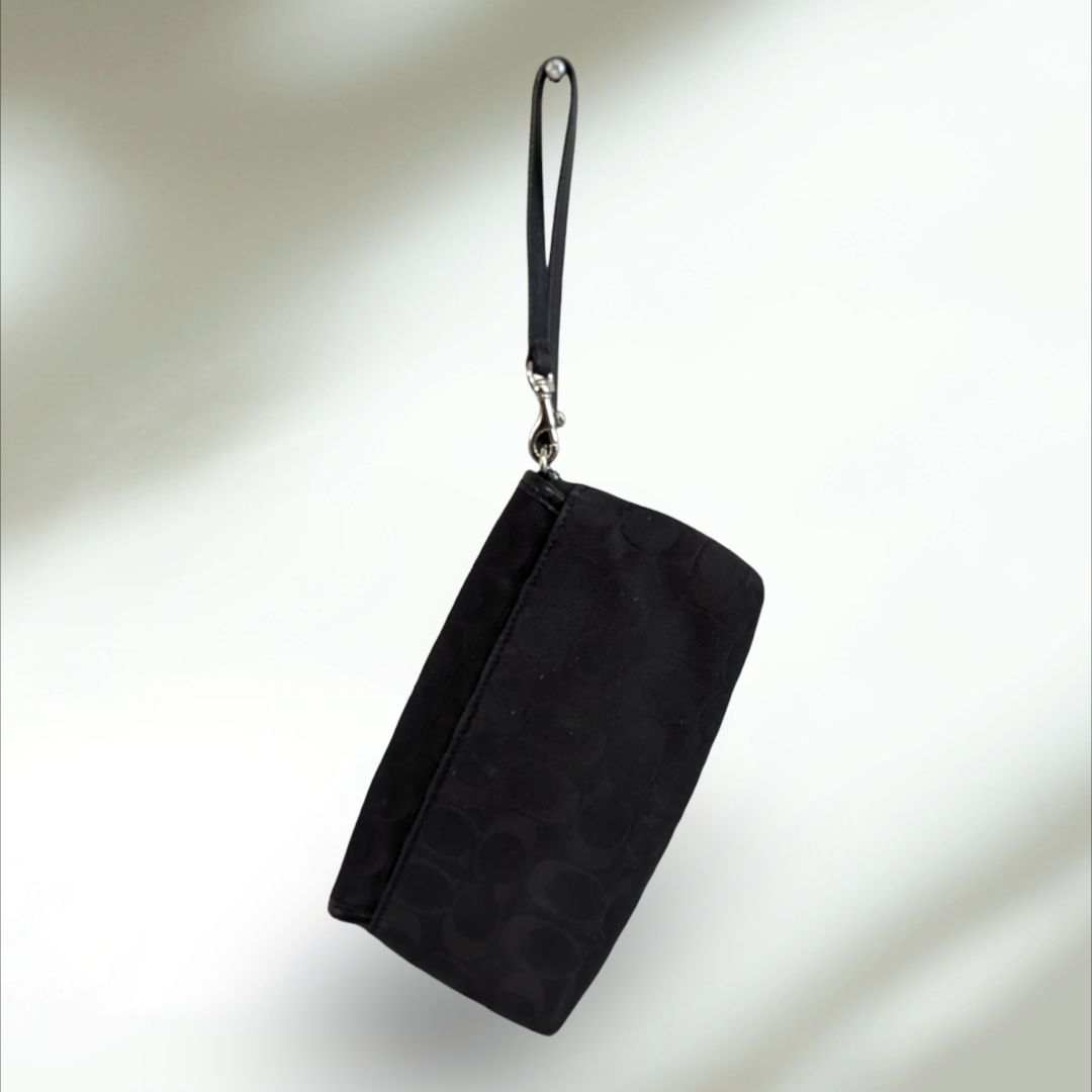 COACH Signature large flap Wristlet