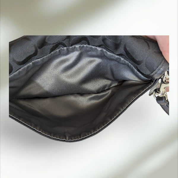 COACH Signature large flap Wristlet