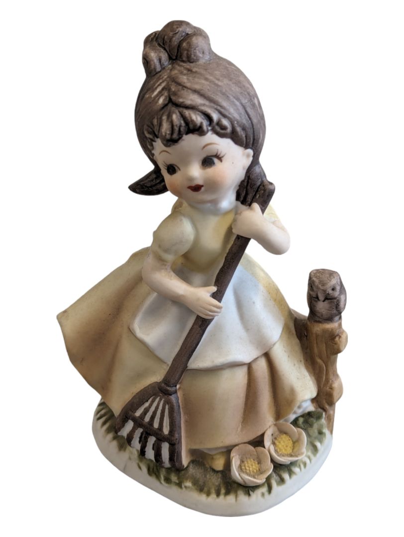 Girl Figurine Yellow Dress w/ Rake