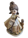 Girl Figurine Yellow Dress w/ Rake