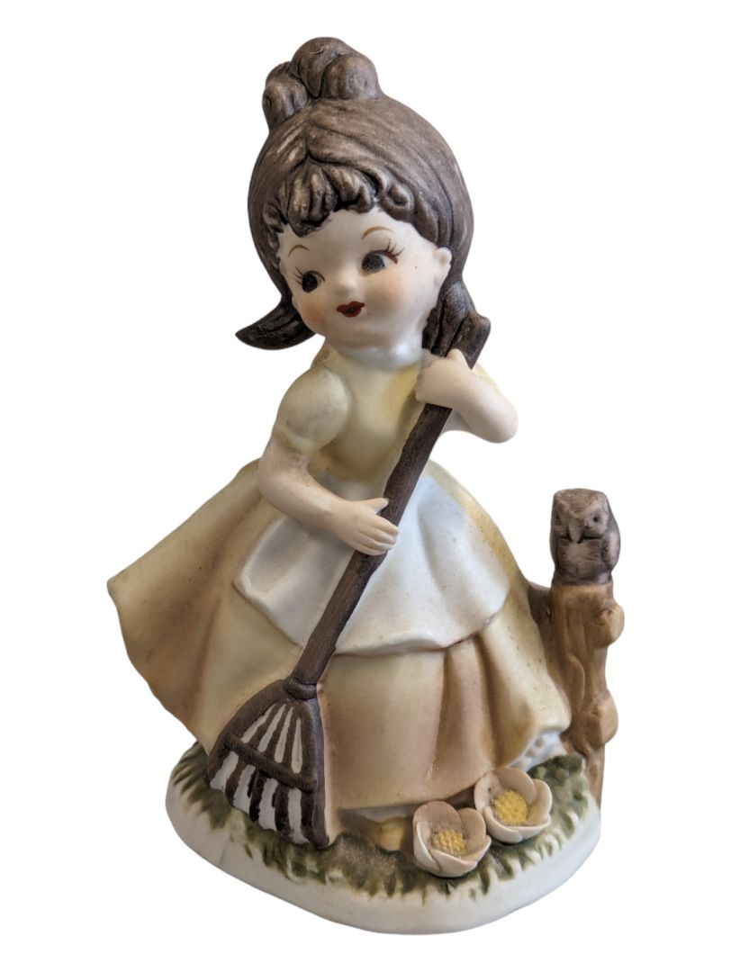 Girl Figurine Yellow Dress w/ Rake