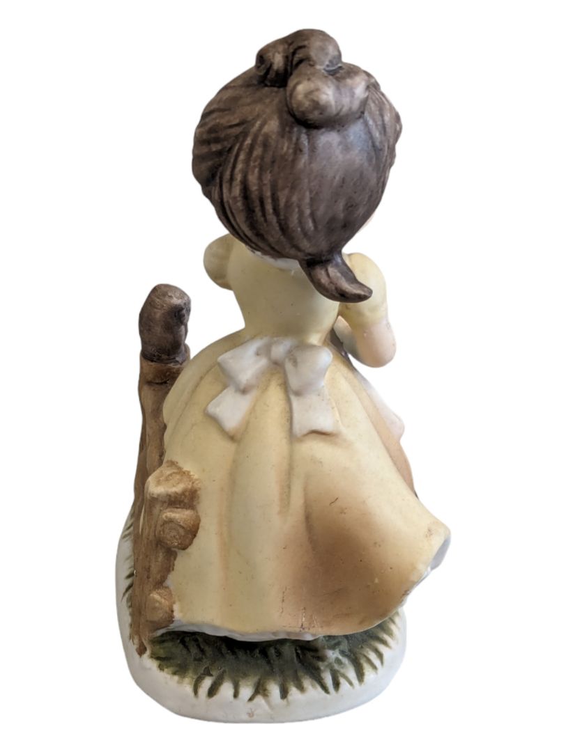 Girl Figurine Yellow Dress w/ Rake