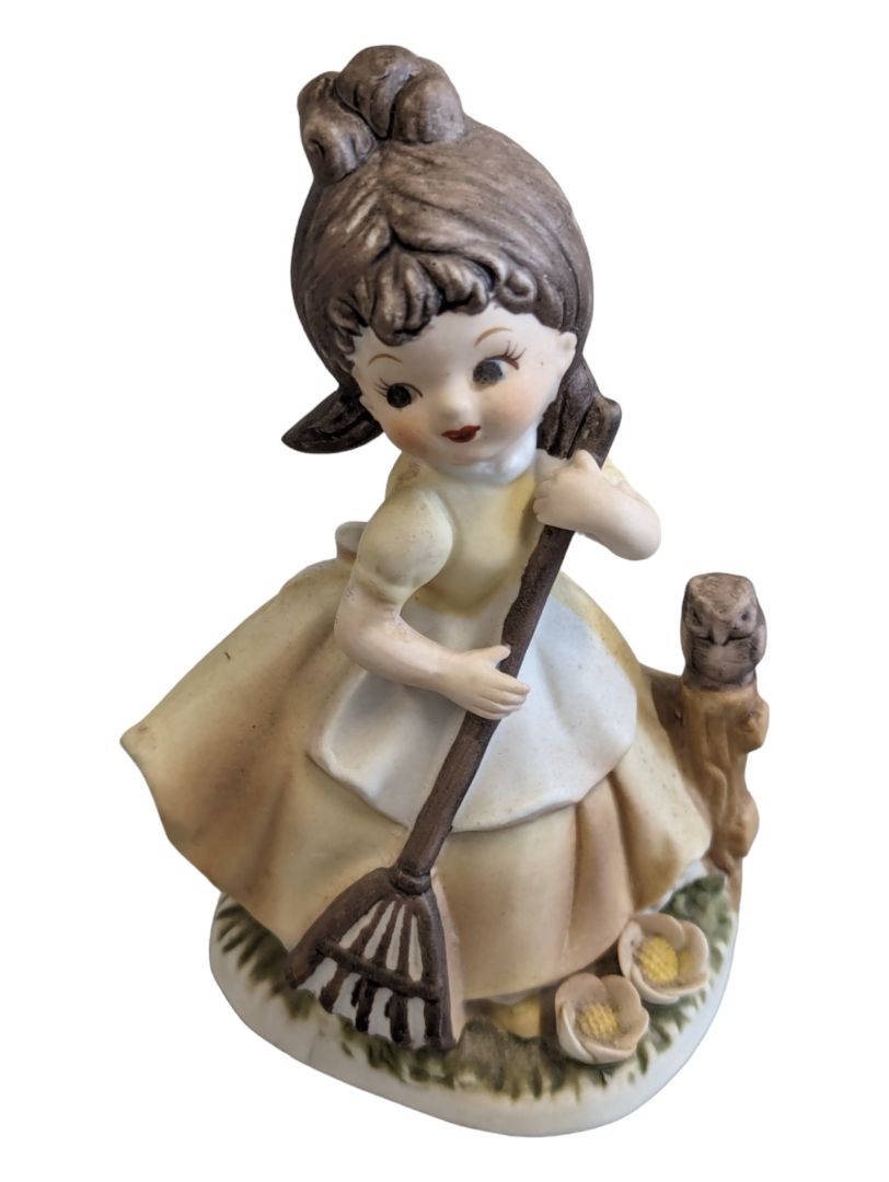 Girl Figurine Yellow Dress w/ Rake