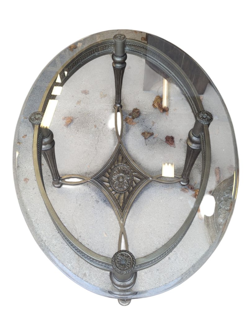 Solid oval glass table with metal base