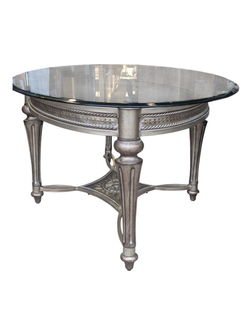 Solid oval glass table with metal base