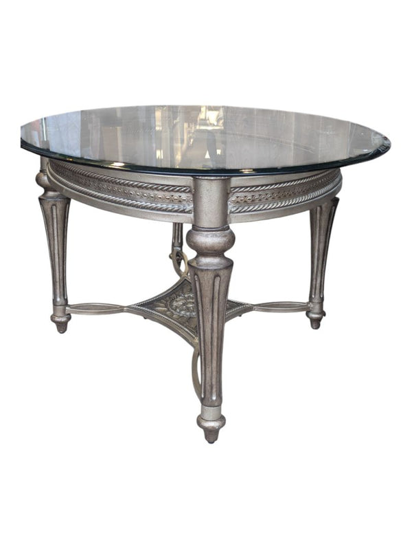 Solid oval glass table with metal base