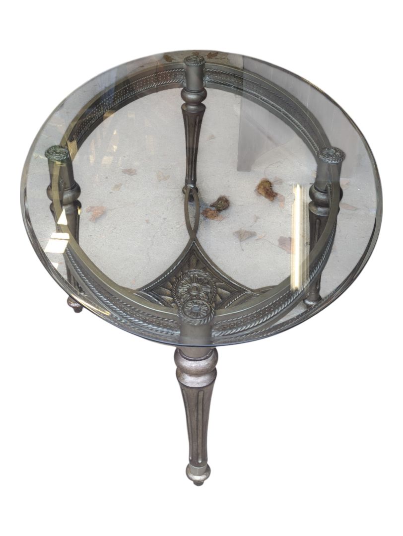 Solid oval glass table with metal base