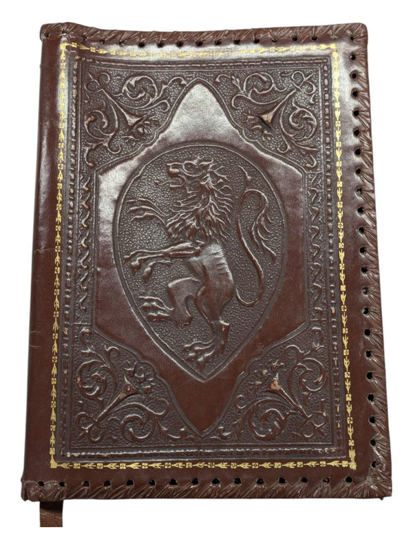 Lion embossed leather book cover