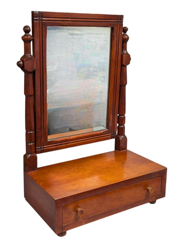Wood framed stand mirror with drawer