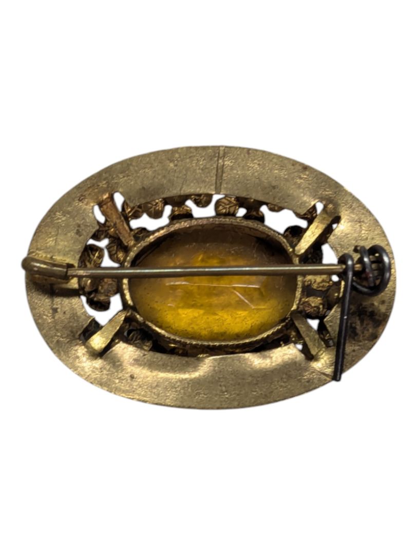 Amber-tone Brooch and Leather Bag