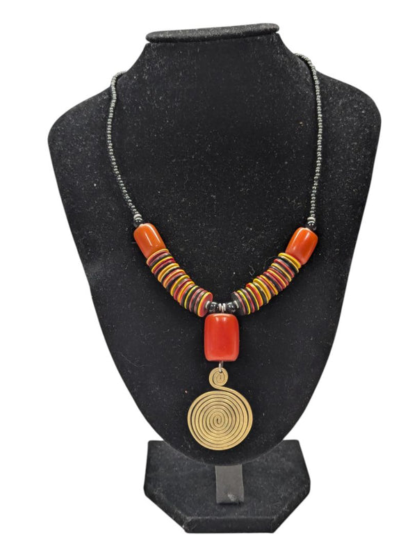 Orange, Yellow, and Black Necklace with Gold Tone Pendent