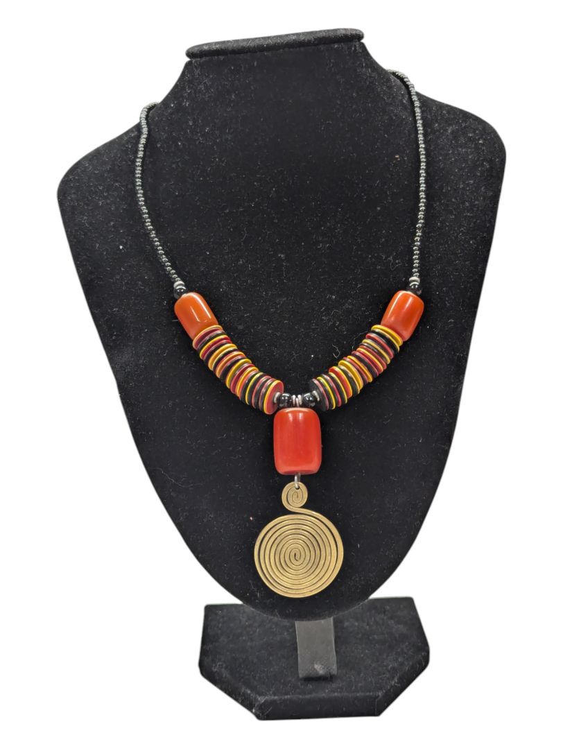 Orange, Yellow, and Black Necklace with Gold Tone Pendent
