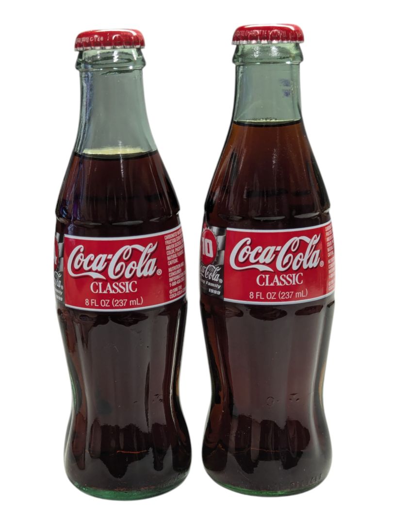Pair of Classic Coca-Cola Racing Family 1999 Bottles