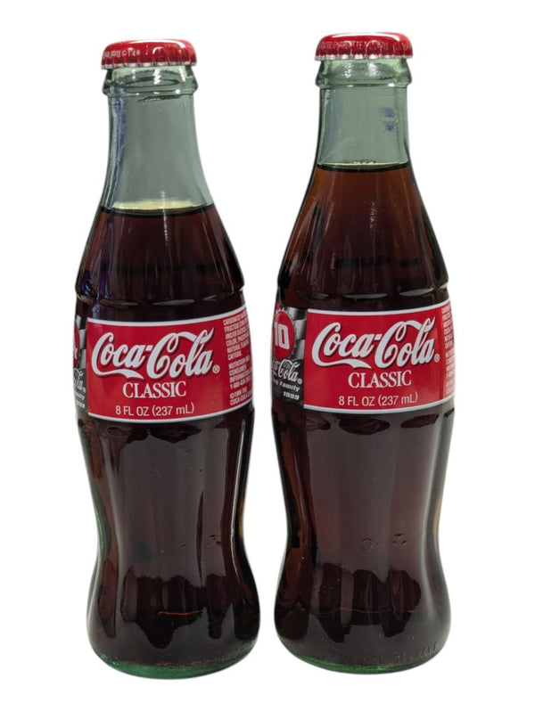 Pair of Classic Coca-Cola Racing Family 1999 Bottles