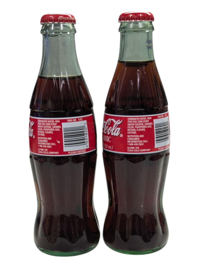Pair of Classic Coca-Cola Racing Family 1999 Bottles