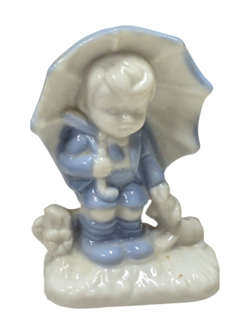 Kid w/ Umbrella Porcelain Figurine