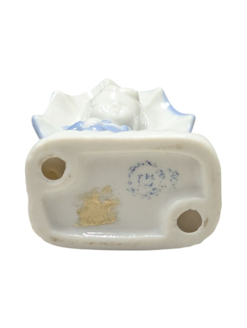 Kid w/ Umbrella Porcelain Figurine