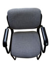 Grey Upholstered Sled-Base Guest Chair with Black Arms