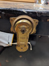 Antique Black Metal Steamer Trunk with Brass-Tone Hardware