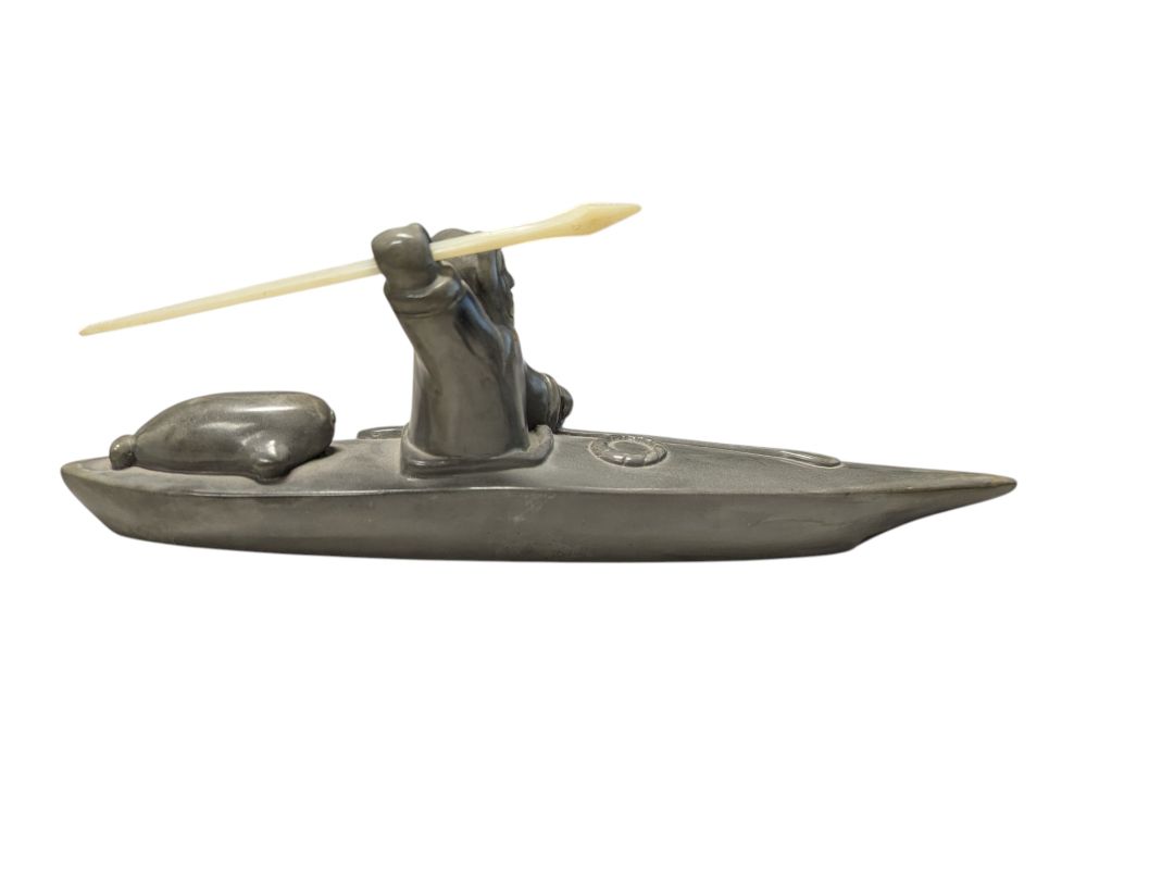 Signed “Thory Canada” Inuit-Style Hunter in Kayak Sculpture