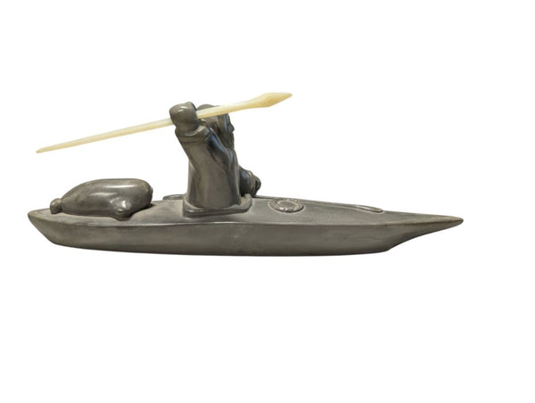Signed “Thory Canada” Inuit-Style Hunter in Kayak Sculpture