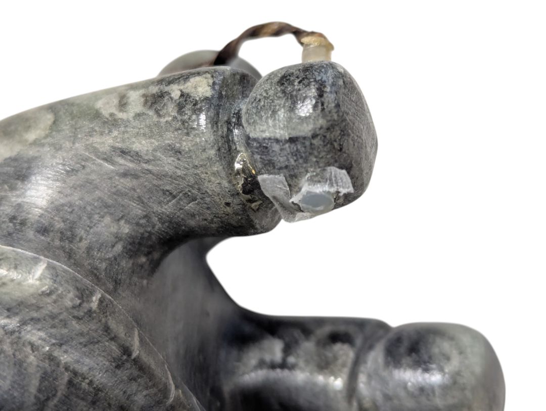 Vintage Inuit-Style Carved Stone Figure with Hand Tool