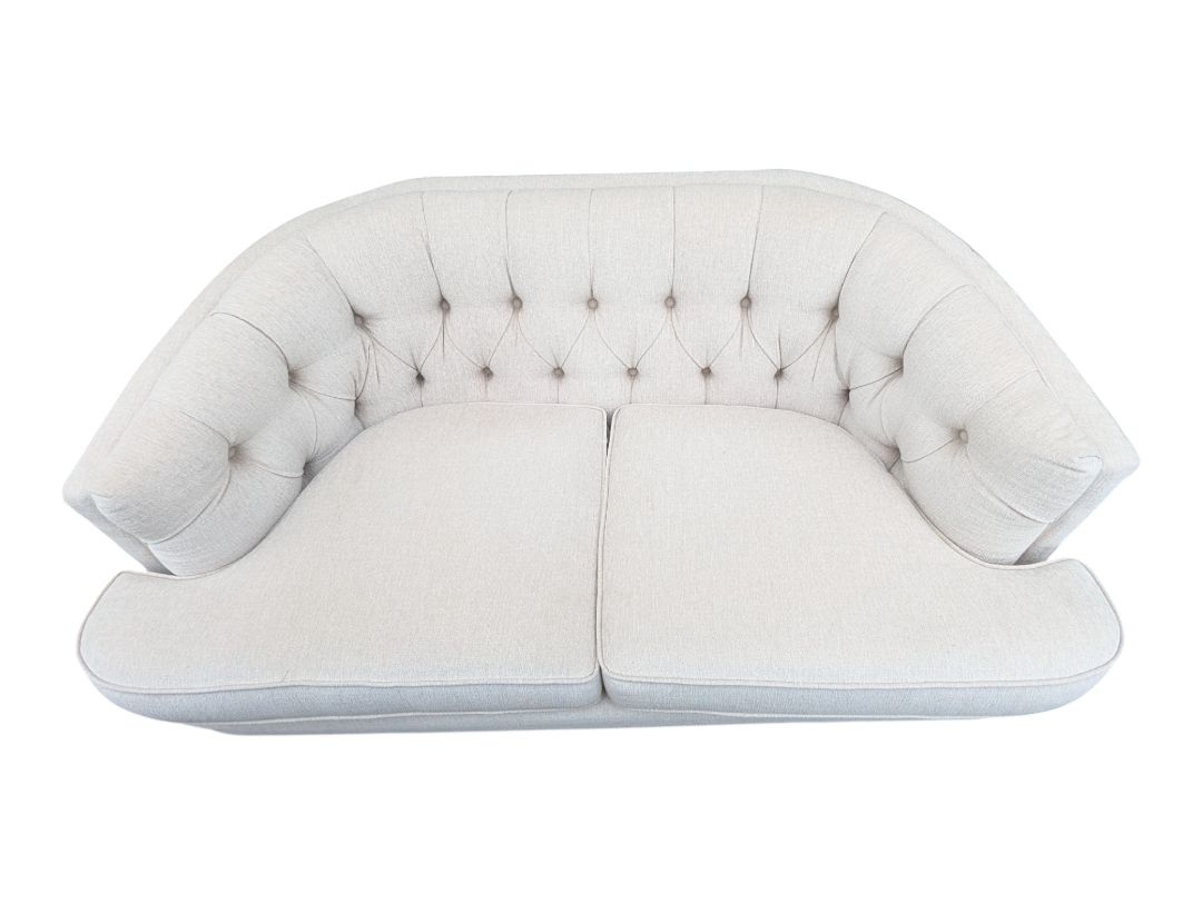 Cream Curved Tufted Sofa with Accent Pillows
